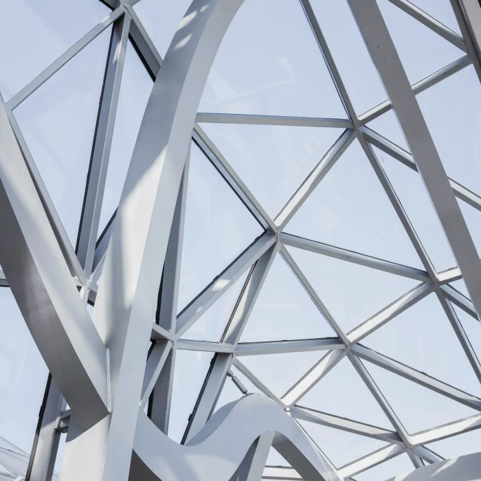 vertical-low-angle-shot-ceiling-white-geometrical-buildings